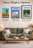 Three framed display options for national park posters on a green couch, showcasing sizes and styles.